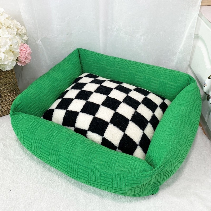 cama del animal doméstico del snoozer