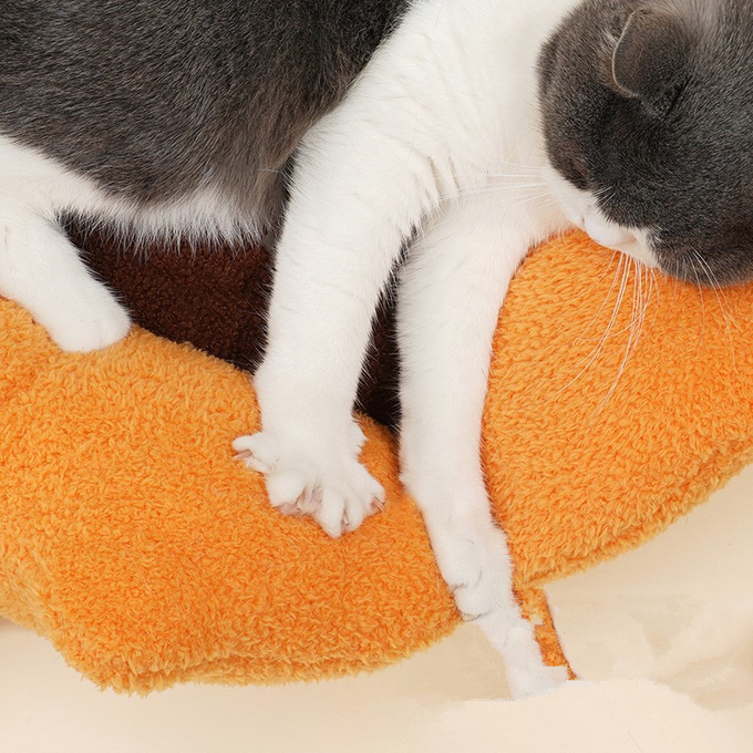 cama del animal doméstico que calma para los gatos